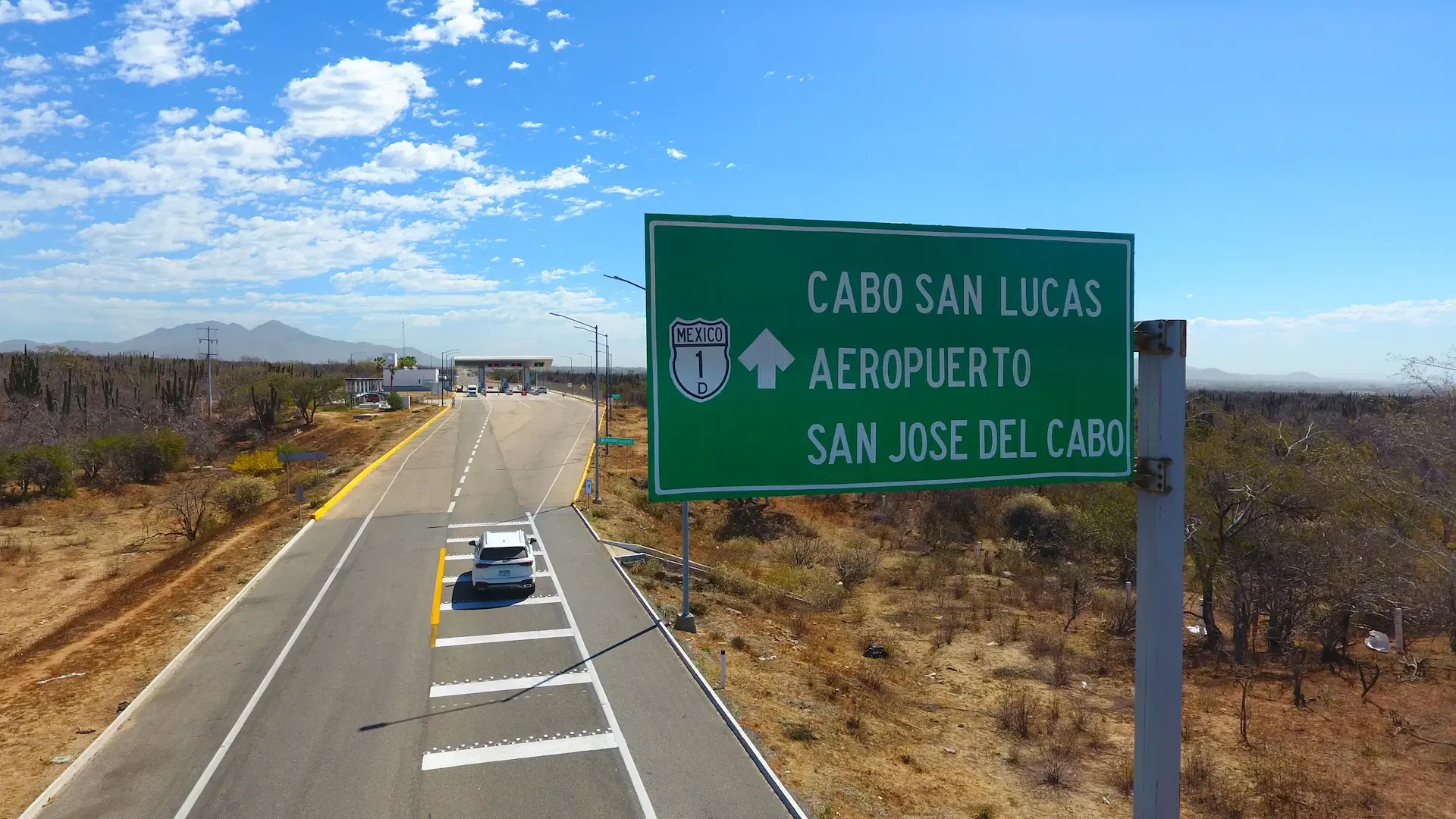 blue sky with desert of cabo san lucas toll road 